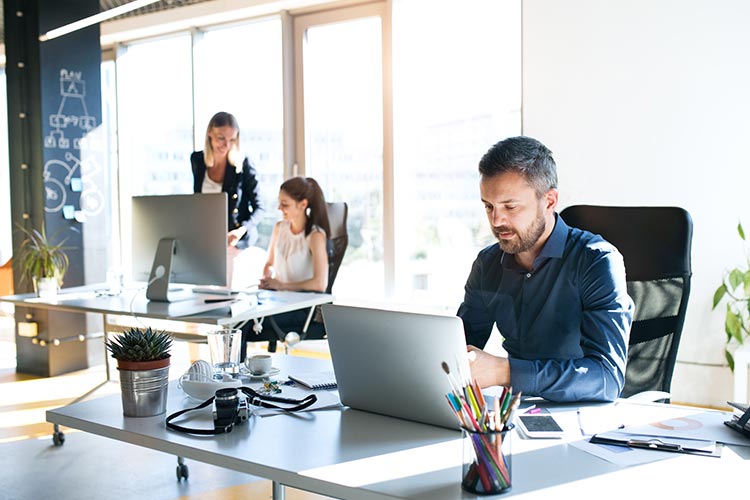 Office-workers-using-internet Office workers using internet